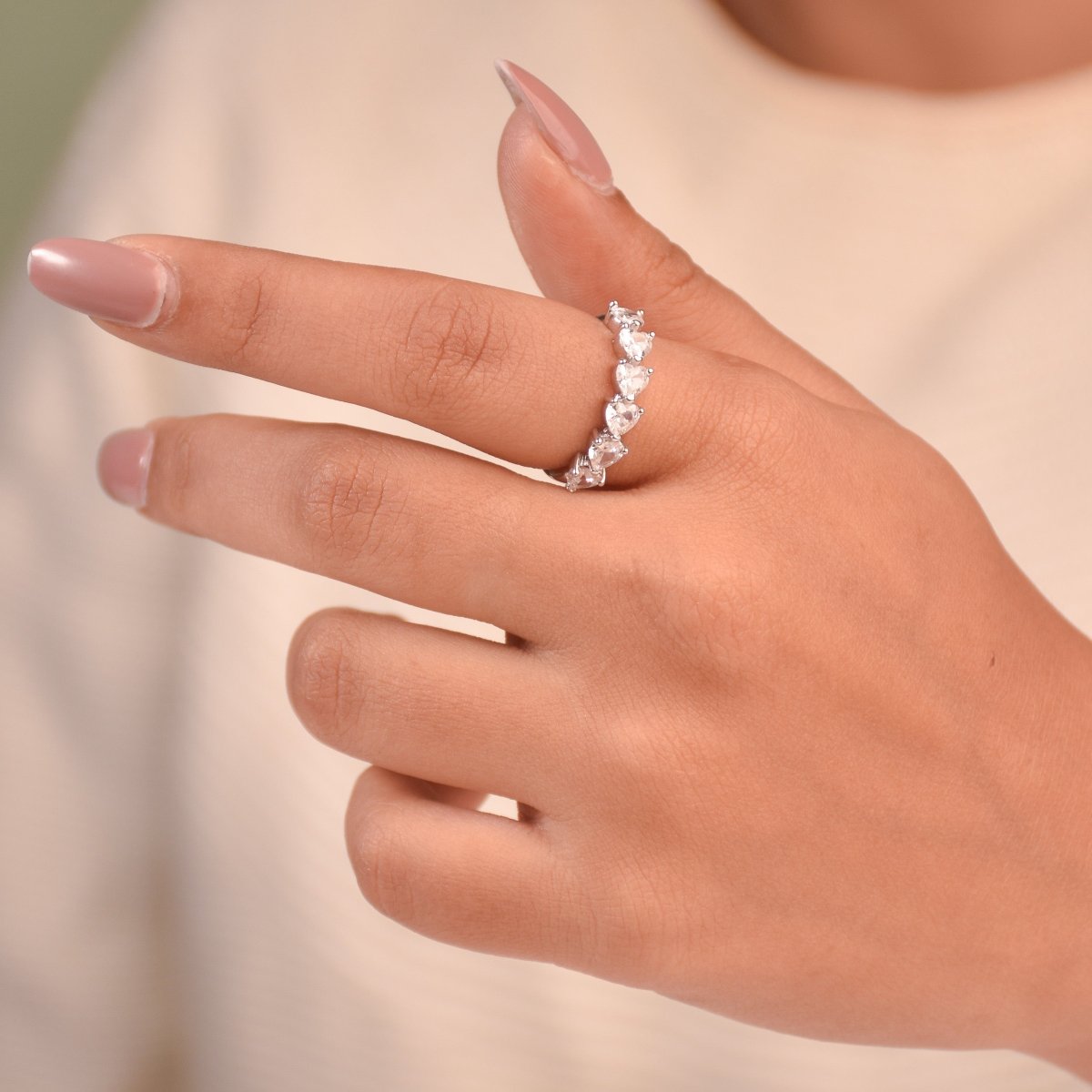Delicate silver heart-cut crystal ring with an adjustable open-shank design and anti-tarnish finish. perfect for stacking, everyday sparkle, and feminine styling.
