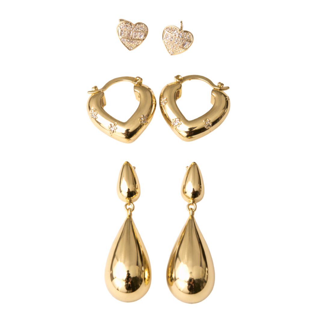 Stylish gold earrings with teardrop design, heart-shaped studs, and heart hoop earrings
