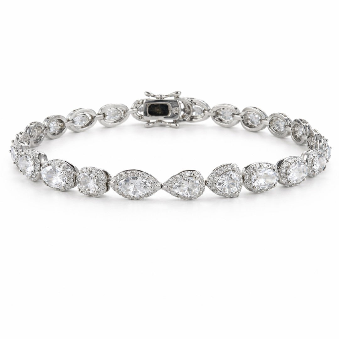 Imperial Sparkle tennis bracelet with multi-cut stones and pavé halo detailing in a polished metal finish