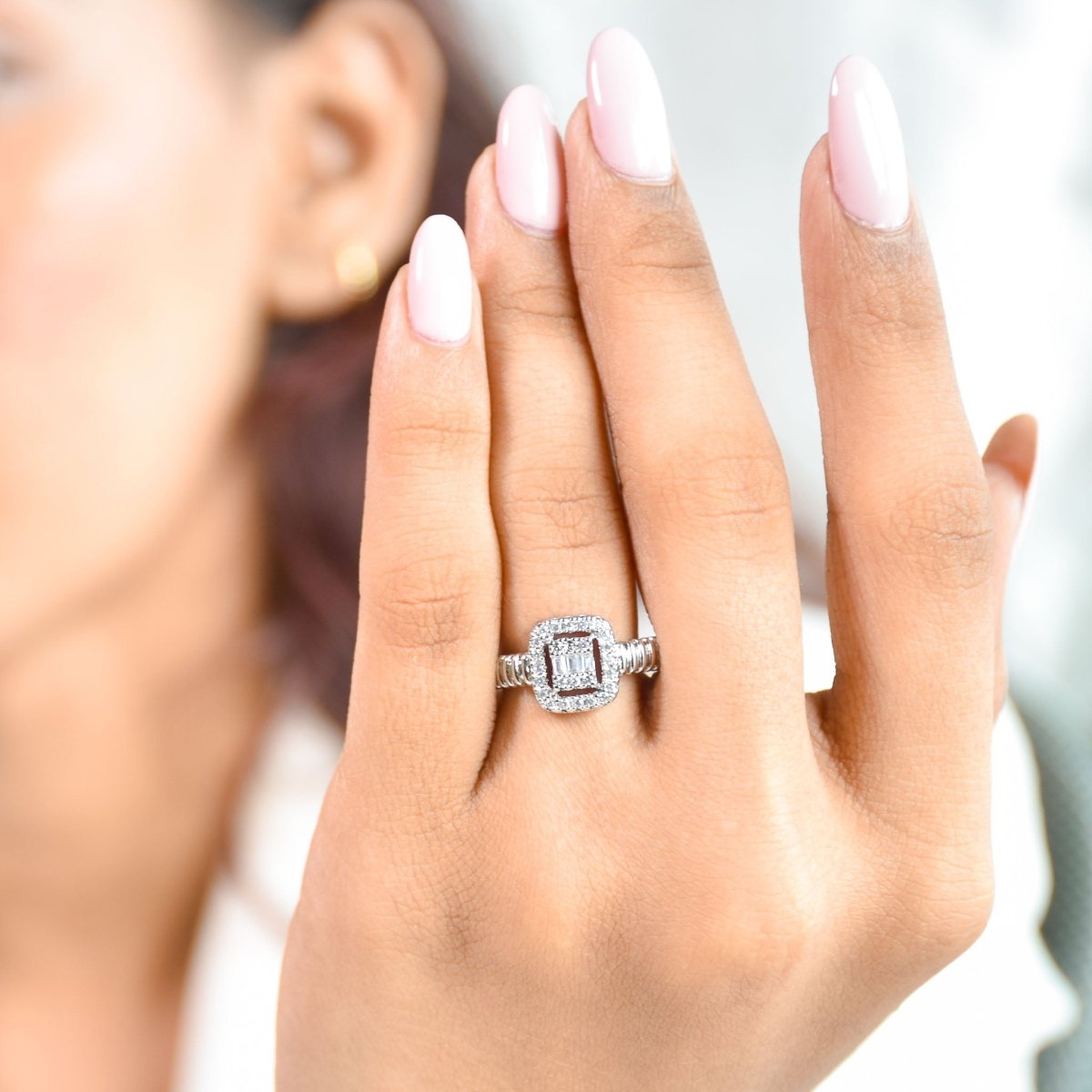 Luxurious silver statement ring featuring a sparkling square crystal centerpiece, ribbed detailing, and anti-tarnish finish, perfect for elegant occasions, evening wear, and bold sophisticated styling.
