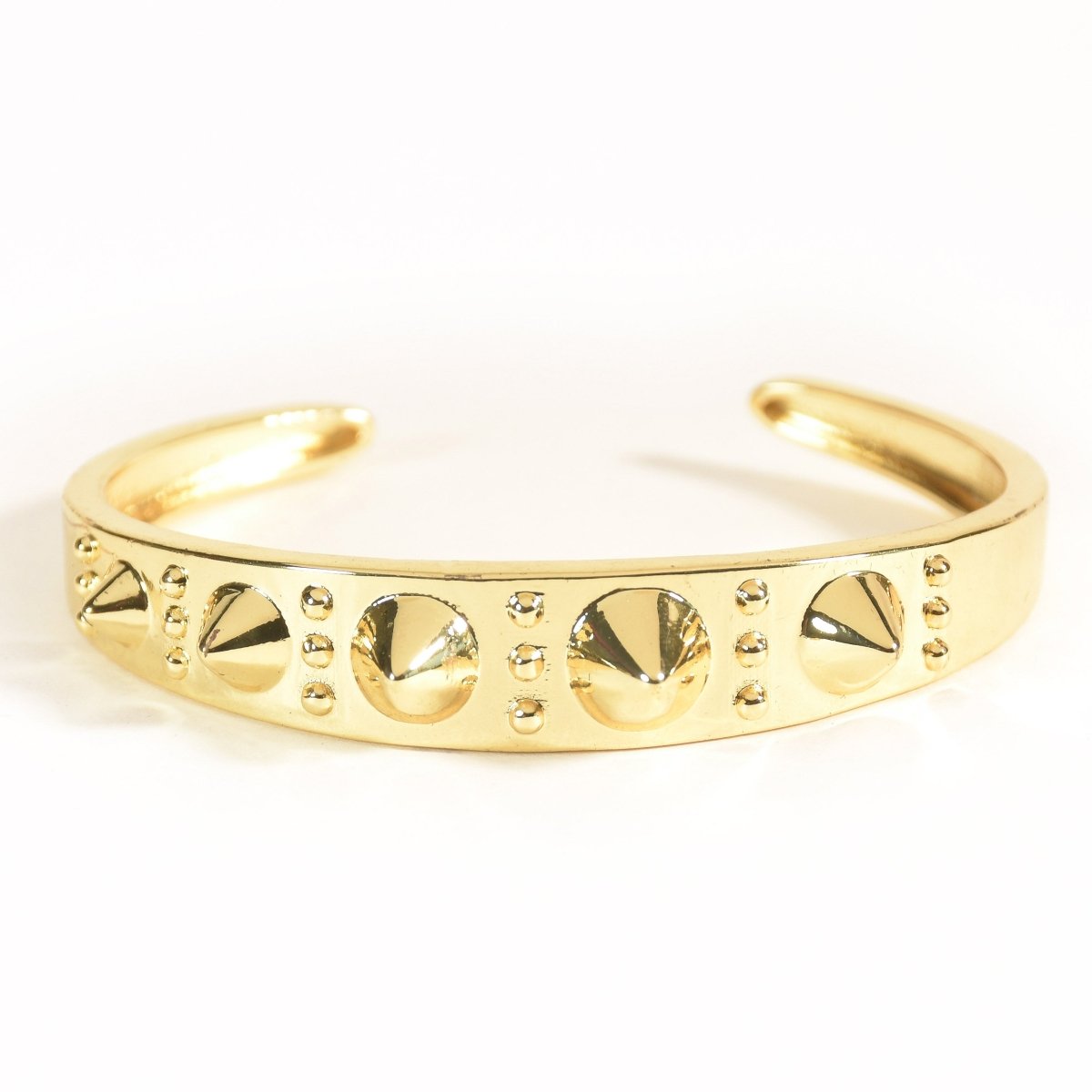 Bold golden spike cuff bangle with an edgy adjustable design and anti-tarnish finish, perfect for statement styling, parties, and modern glam looks.