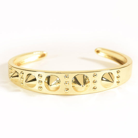 Bold golden spike cuff bangle with an edgy adjustable design and anti-tarnish finish, perfect for statement styling, parties, and modern glam looks.