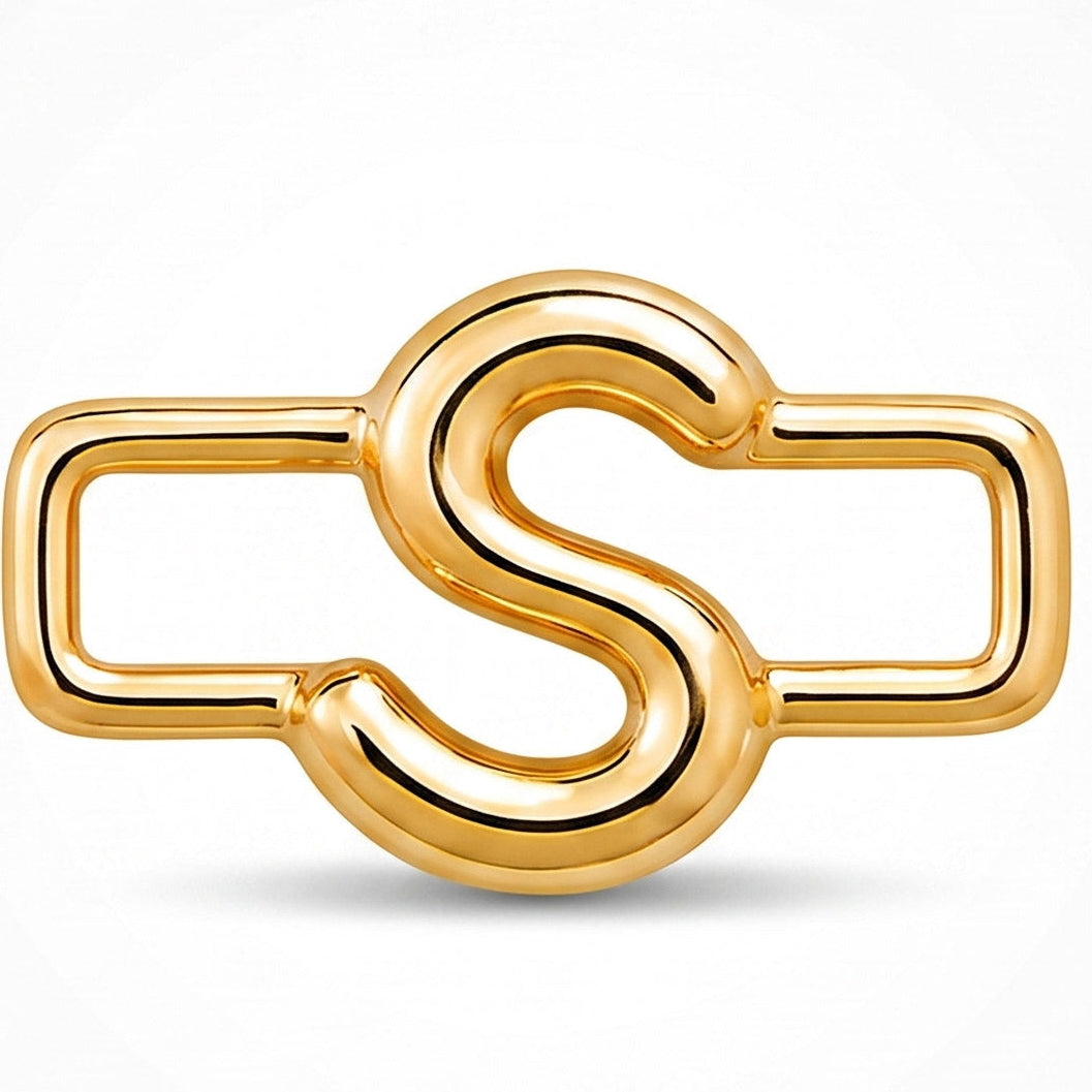 A polished gold-tone letter “S” charm with a glossy, reflective finish, featuring a bold uppercase A design integrated with a rectangular open-link frame. The charm has smooth rounded edges, a modern minimalist style, and a bright metallic surface, displayed against a clean white background.