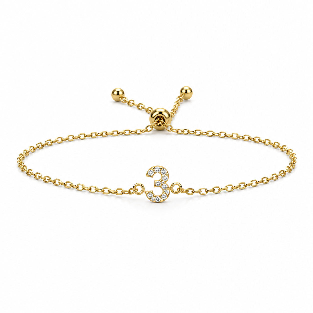 Gold chain lucky number 3 crystal bracelet with an adjustable slider clasp on a white background.