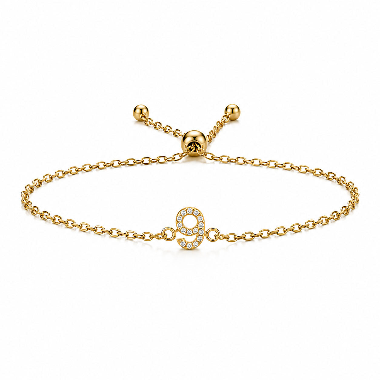 Gold chain lucky number 9 crystal bracelet with an adjustable slider clasp on a white background.