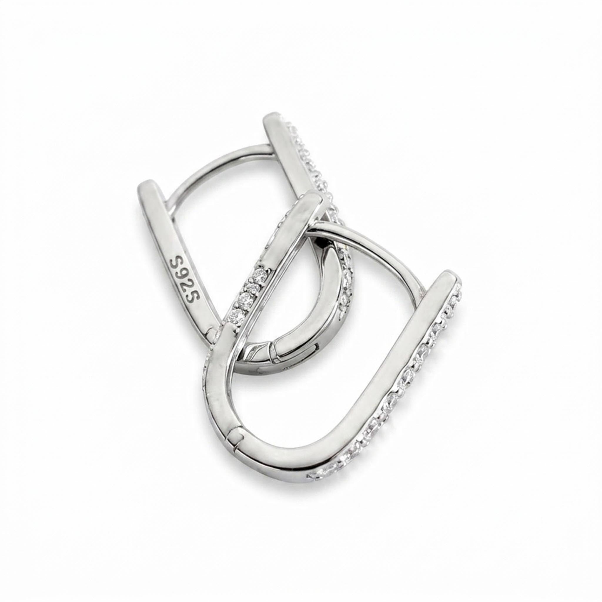 Luna Shine 925 Sterling Silver hoop earrings featuring a sleek elongated oval design accented with a row of sparkling cubic zirconia stones along the front edge