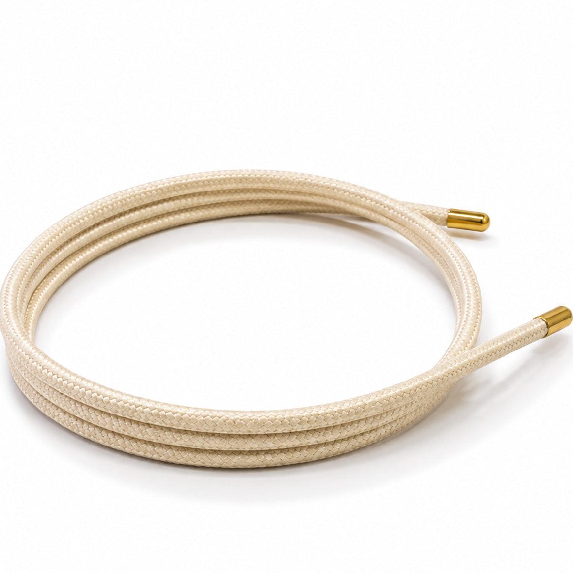 Off-white cream magnetic mesh wrap bracelet with polished gold end caps coiled on a white background.