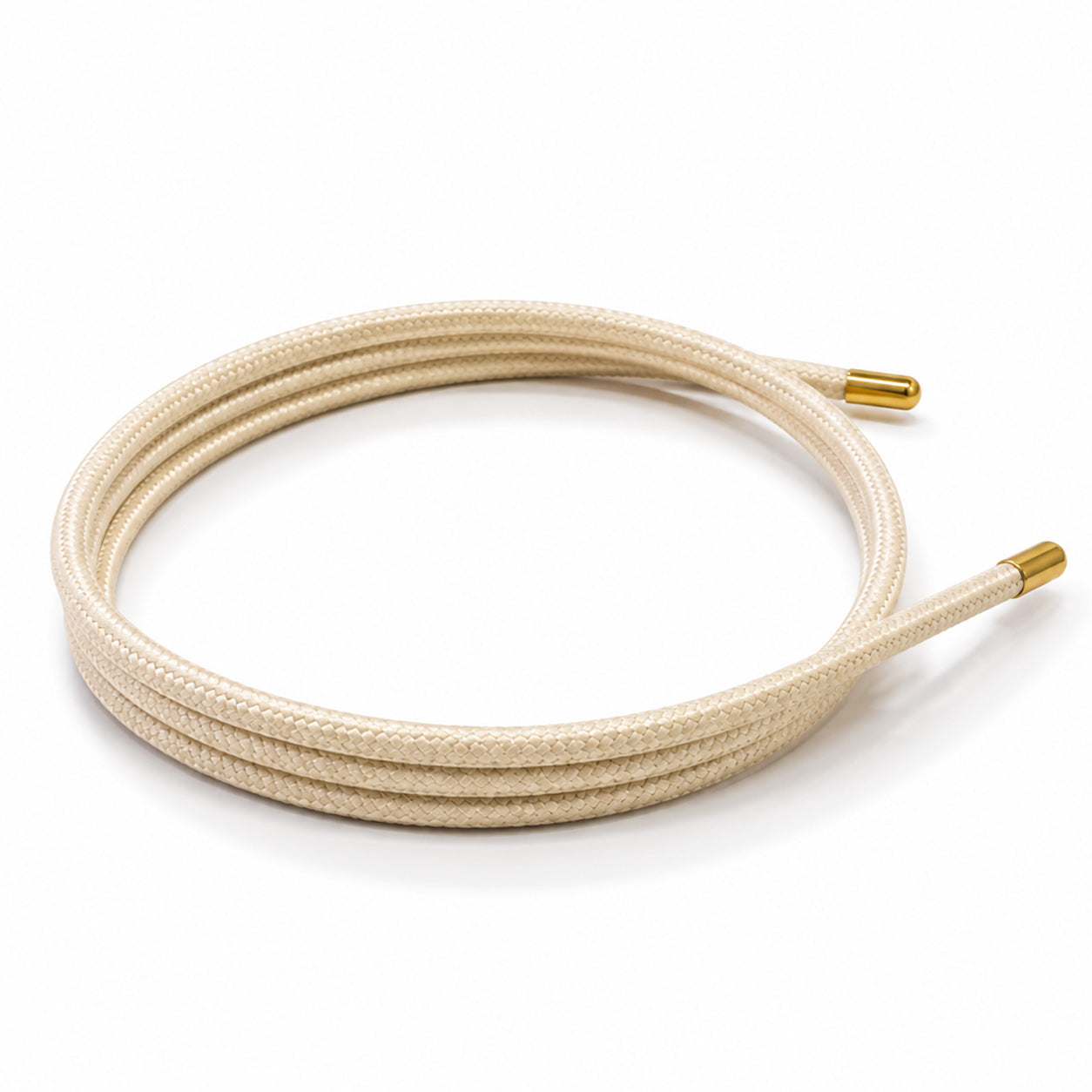 Off-white cream magnetic mesh wrap bracelet with polished gold end caps coiled on a white background.