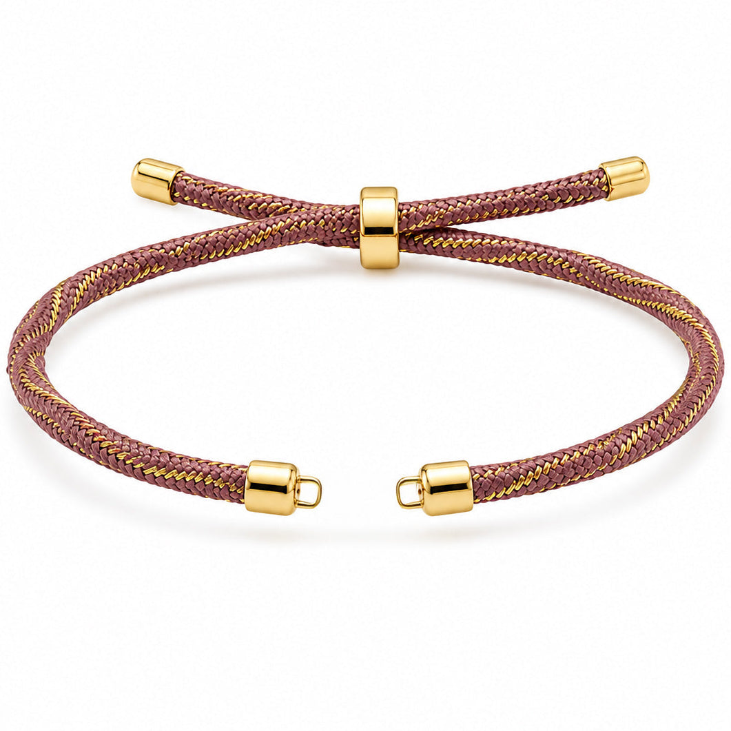 Burgundy braided cord bracelet with gold-tone woven detailing, end caps, and a central adjustable sliding clasp, displayed on a clean white background.