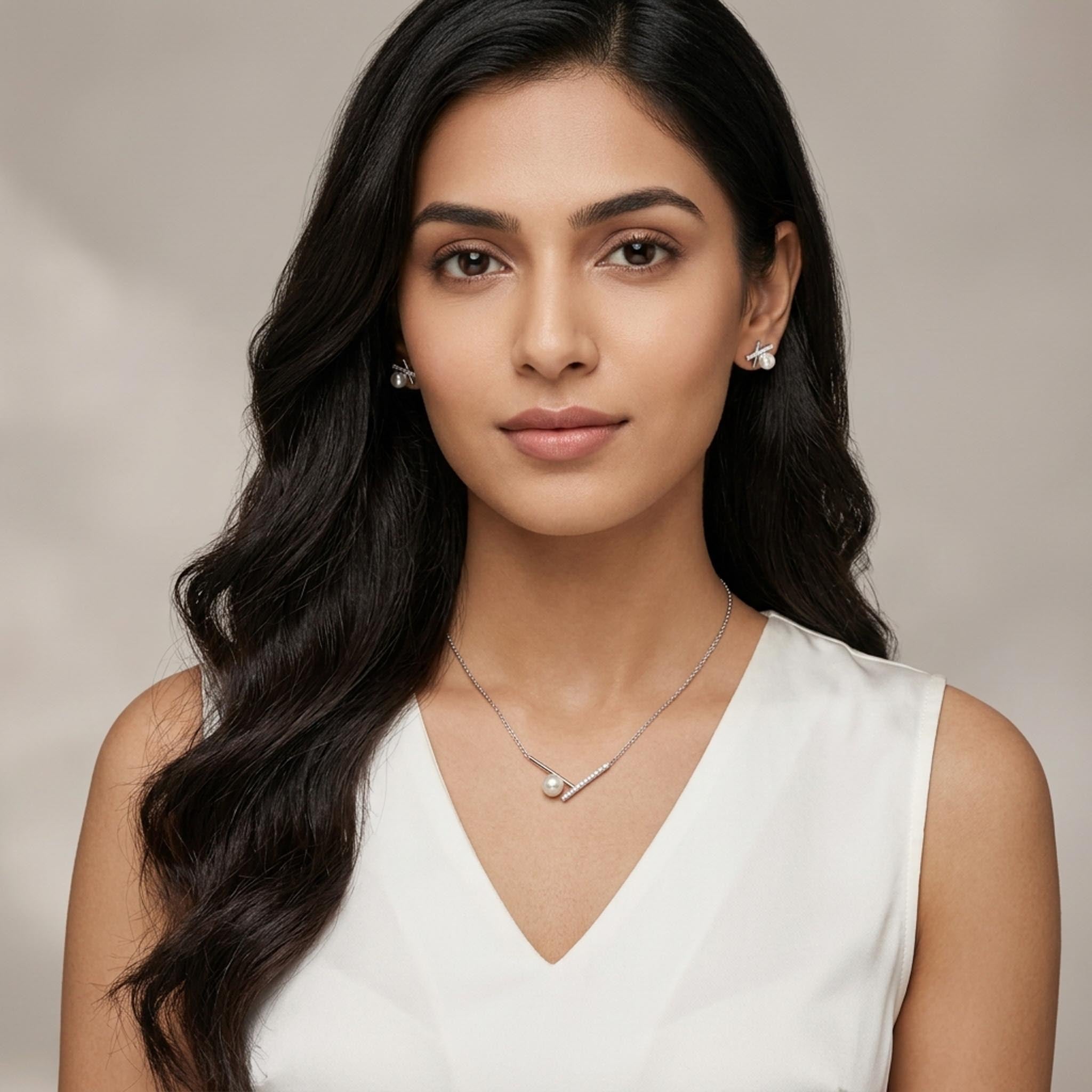 Modern Pearl 925 Sterling Silver Necklace Set featuring an asymmetrical pearl pendant with a sparkling pave bar design, paired with matching pearl stud earrings