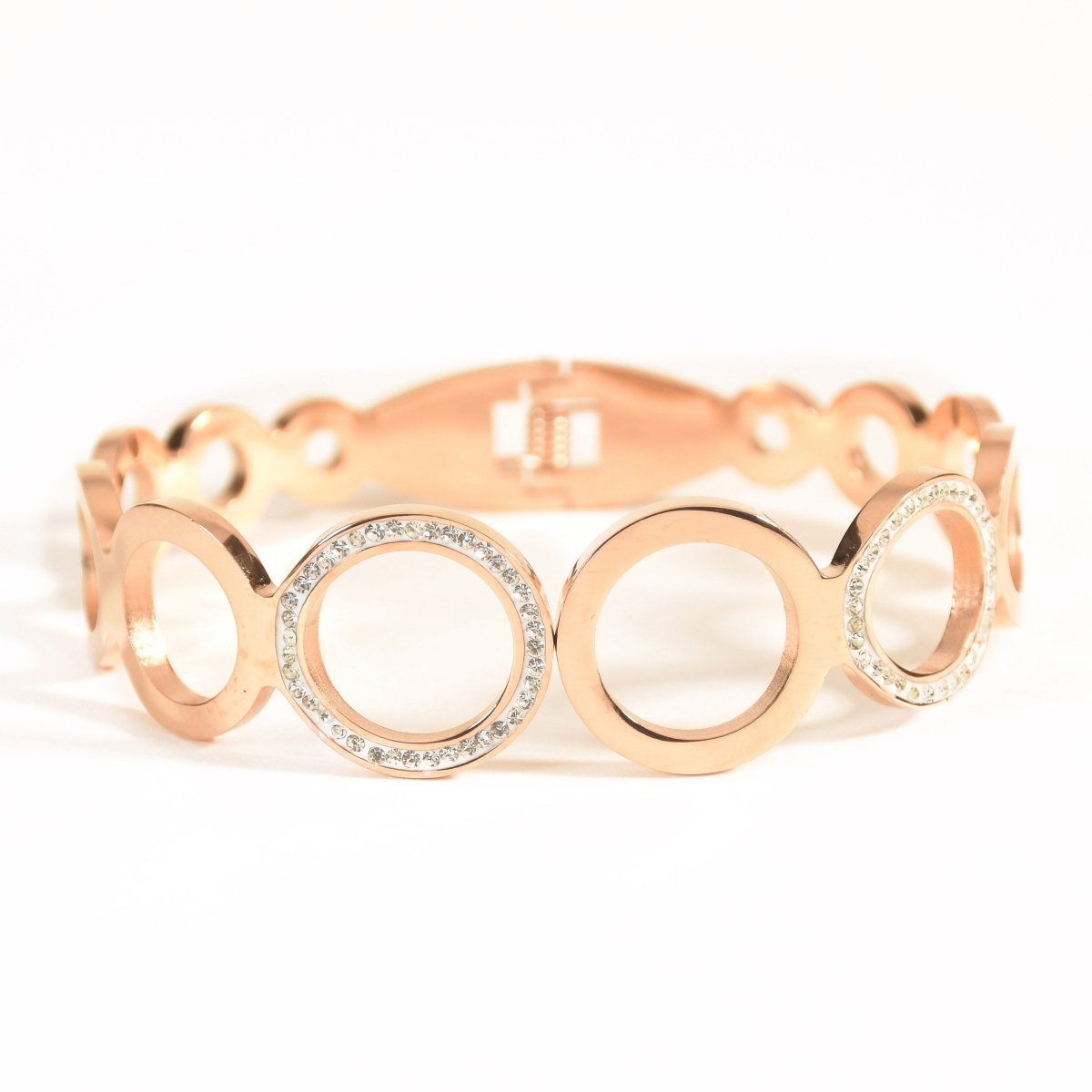 Elegant rosegold multi-ring bangle with sparkling stone detailing and an anti-tarnish finish, perfect for brunch dates, party looks, and chic everyday styling