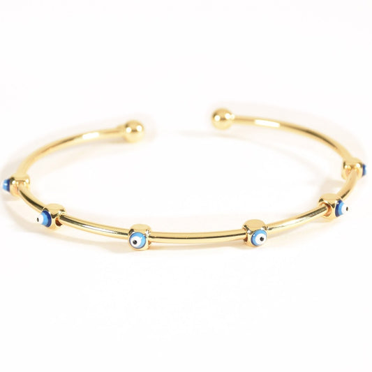 Multi evil eye cuff bangle with protective evil eye detailing and an anti-tarnish finish, perfect for everyday wear, meaningful styling, and effortless stacking.
