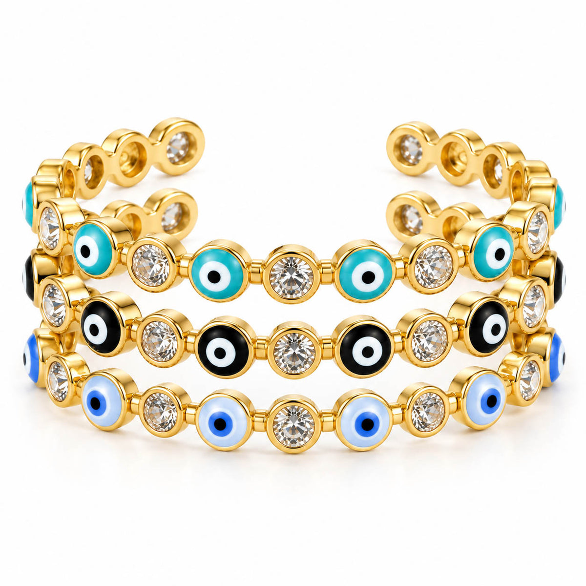 A product photo of a stacked set of gold-tone open cuff bracelets featuring alternating crystal stones and evil eye charms in turquoise, black, and light blue.