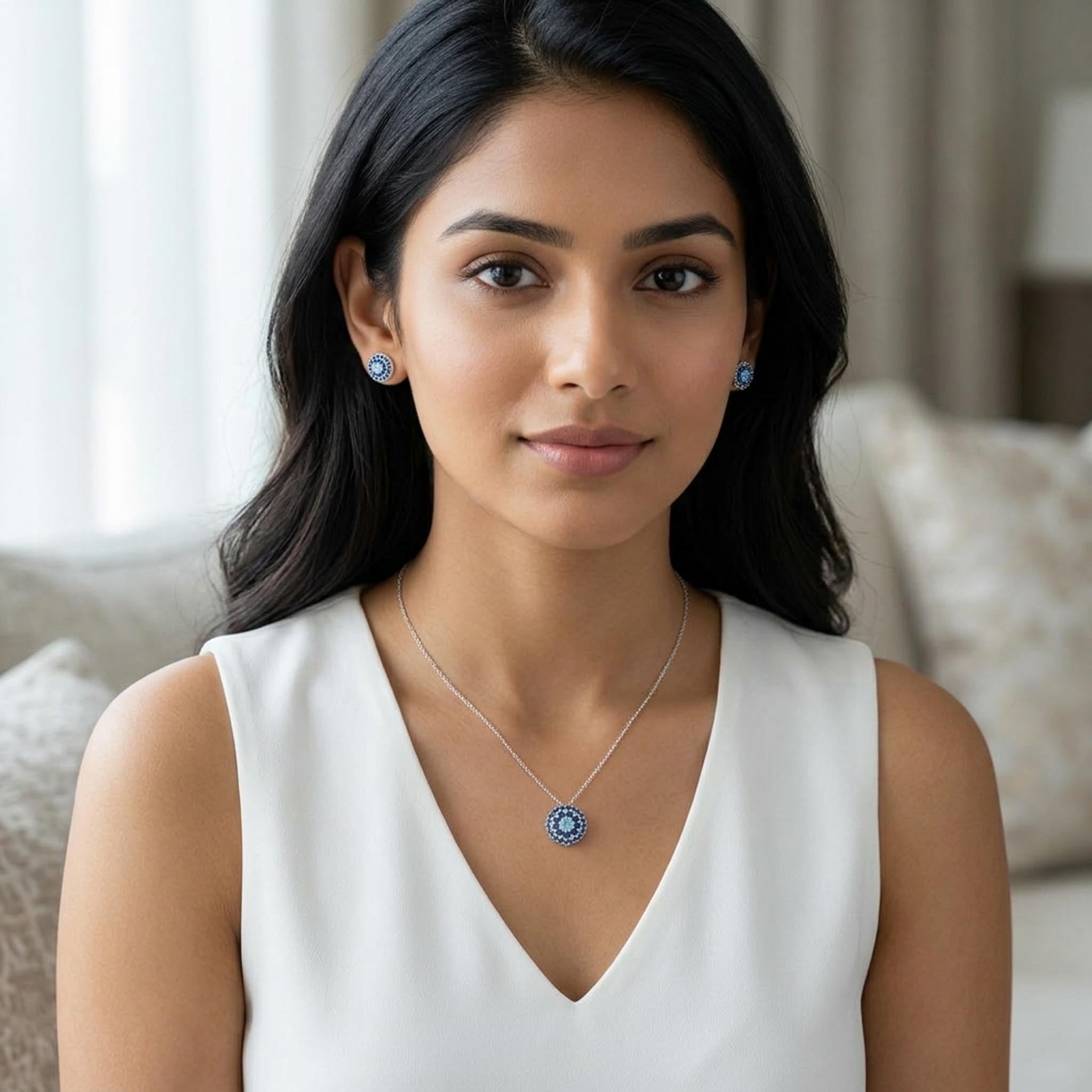 Mystic Evil Eye 925 Sterling Silver Necklace Set featuring a blue evil eye-inspired pendant necklace with concentric sapphire-blue and aqua stones, paired with matching stud earrings