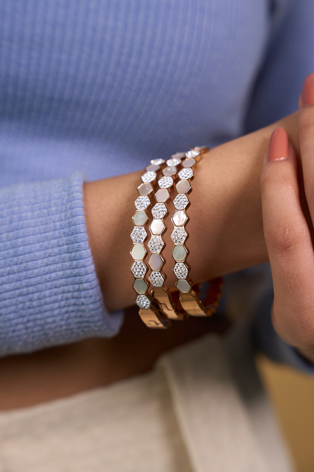 Elegant patterned bangle with mother of pearl detailing and an anti-tarnish finish, crafted for everyday wear, effortless stacking, and timeless sophisticated styling.
