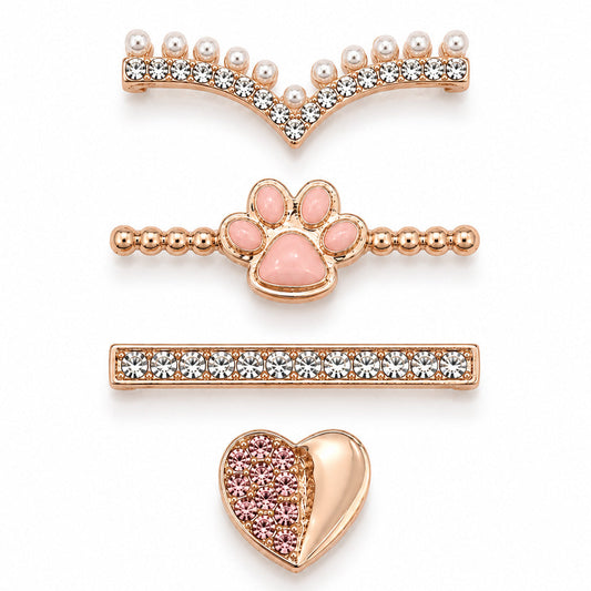 Rose gold-tone watch charms featuring a pearl and crystal V-shaped design, pink paw detail, crystal bar, and pink crystal heart accent, displayed on a white background.
