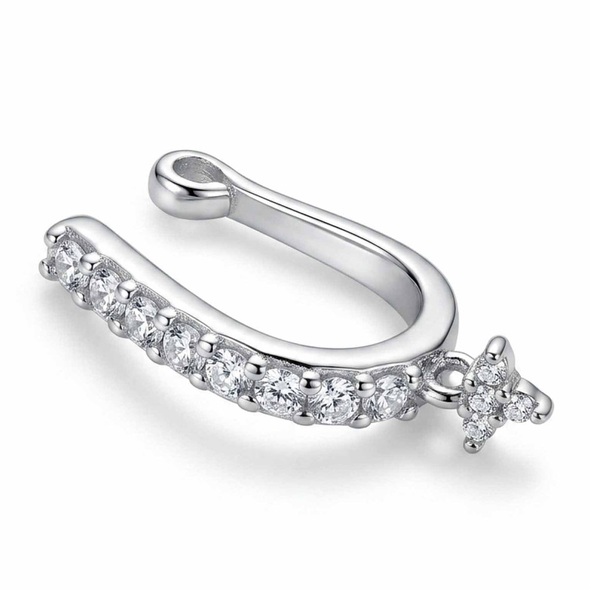 Silver-tone crystal ear cuff featuring a row of sparkling round-cut clear stones along a curved band and a delicate floral crystal accent at the end, with a smooth open cuff design, displayed on a clean white background.