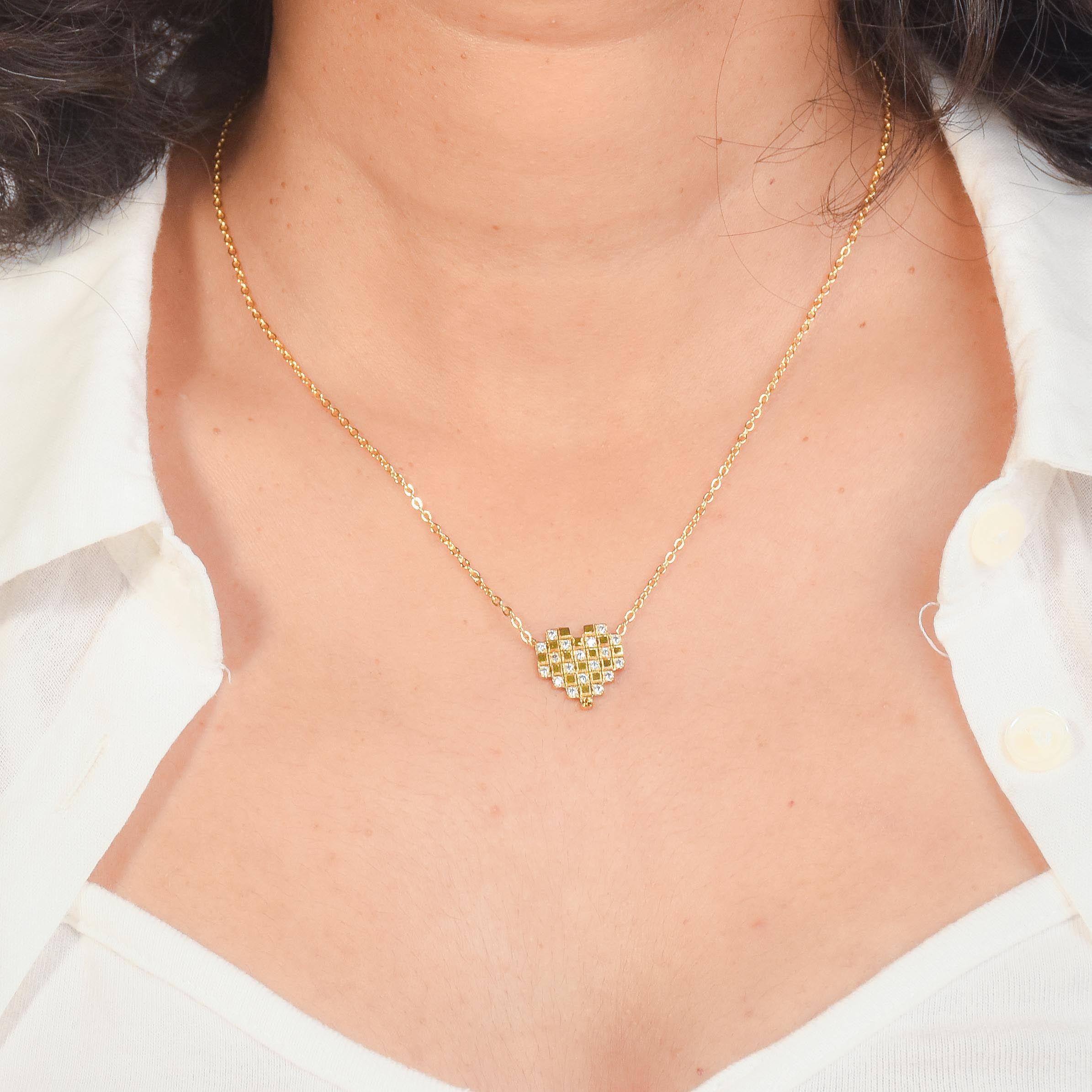 Pixel Heart Necklace Stack with Mosaic Heart, Diamond Dust, and Modern Morse layered gold-tone necklaces
