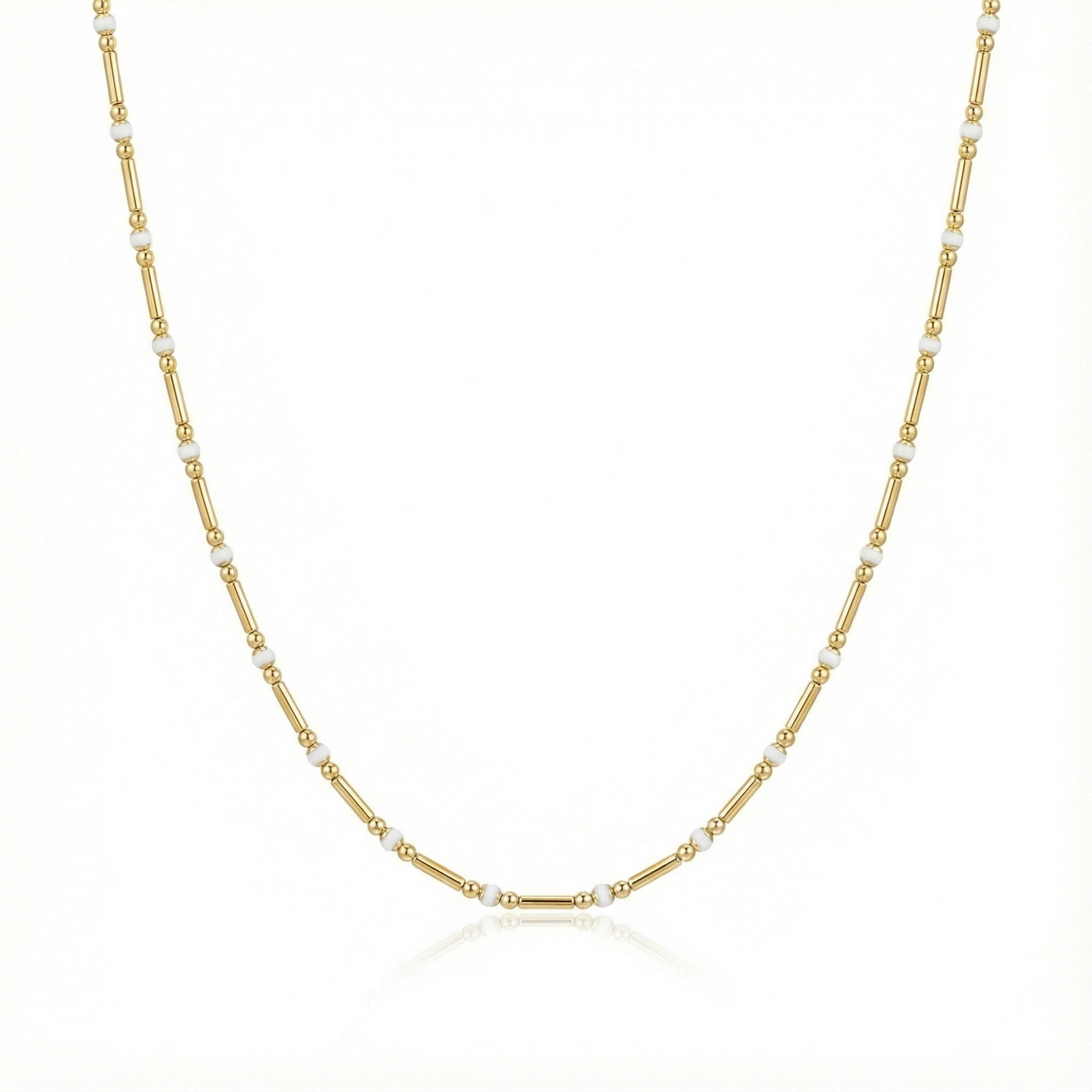 Pixel Heart Necklace Stack with Mosaic Heart, Diamond Dust, and Modern Morse layered gold-tone necklaces