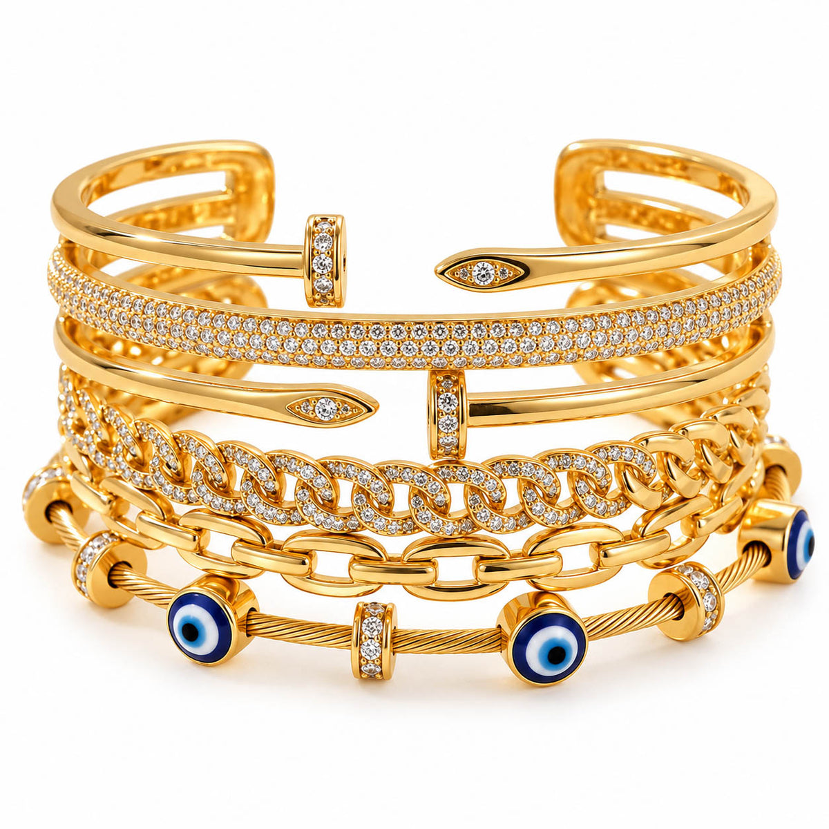 A studio shot of a curated stack of luxury gold bracelets, showcasing multiple designs including a paved diamond band, interlocking curb links, nail-inspired wrap cuffs, and a cable wire bracelet accented with blue and white evil eye beads.   