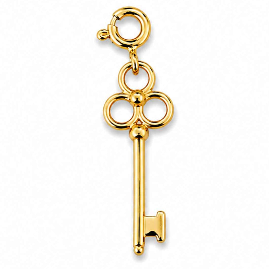 Gold-tone vintage key charm with a polished finish on a white background.