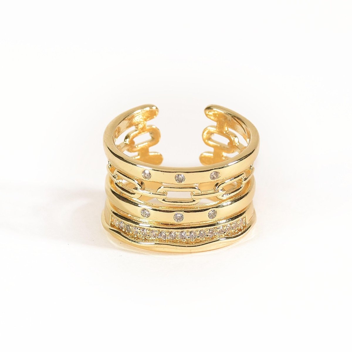 Elegant golden stack ring with subtle shimmer detailing and an adjustable anti-tarnish finish, perfect for everyday wear, stacking, and effortless glam styling.
