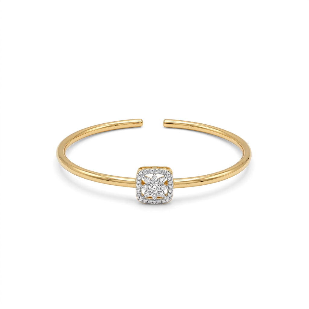 Anti-tarnish yellow gold open cuff bracelet featuring a central square cushion halo motif with a sparkling pavé cubic zirconia floral star cluster, set on a sleek, polished round band.