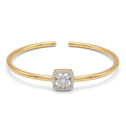 Anti-tarnish yellow gold open cuff bracelet featuring a central square cushion halo motif with a sparkling pavé cubic zirconia floral star cluster, set on a sleek, polished round band.