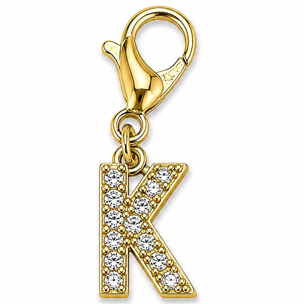 Gold-tone rhinestone-encrusted letter “K” charm with a lobster clasp, displayed on a white background.