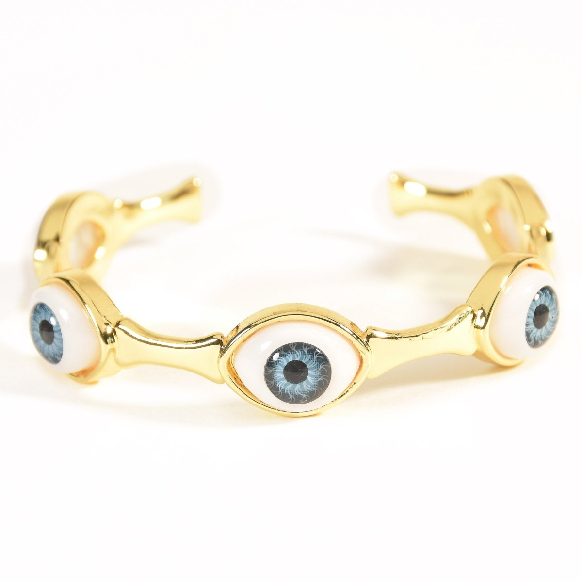 Elegant golden evil eye bangle with multiple charm detailing and an adjustable anti-tarnish finish, perfect for everyday styling, protective charm looks, and chic stacked wear.
