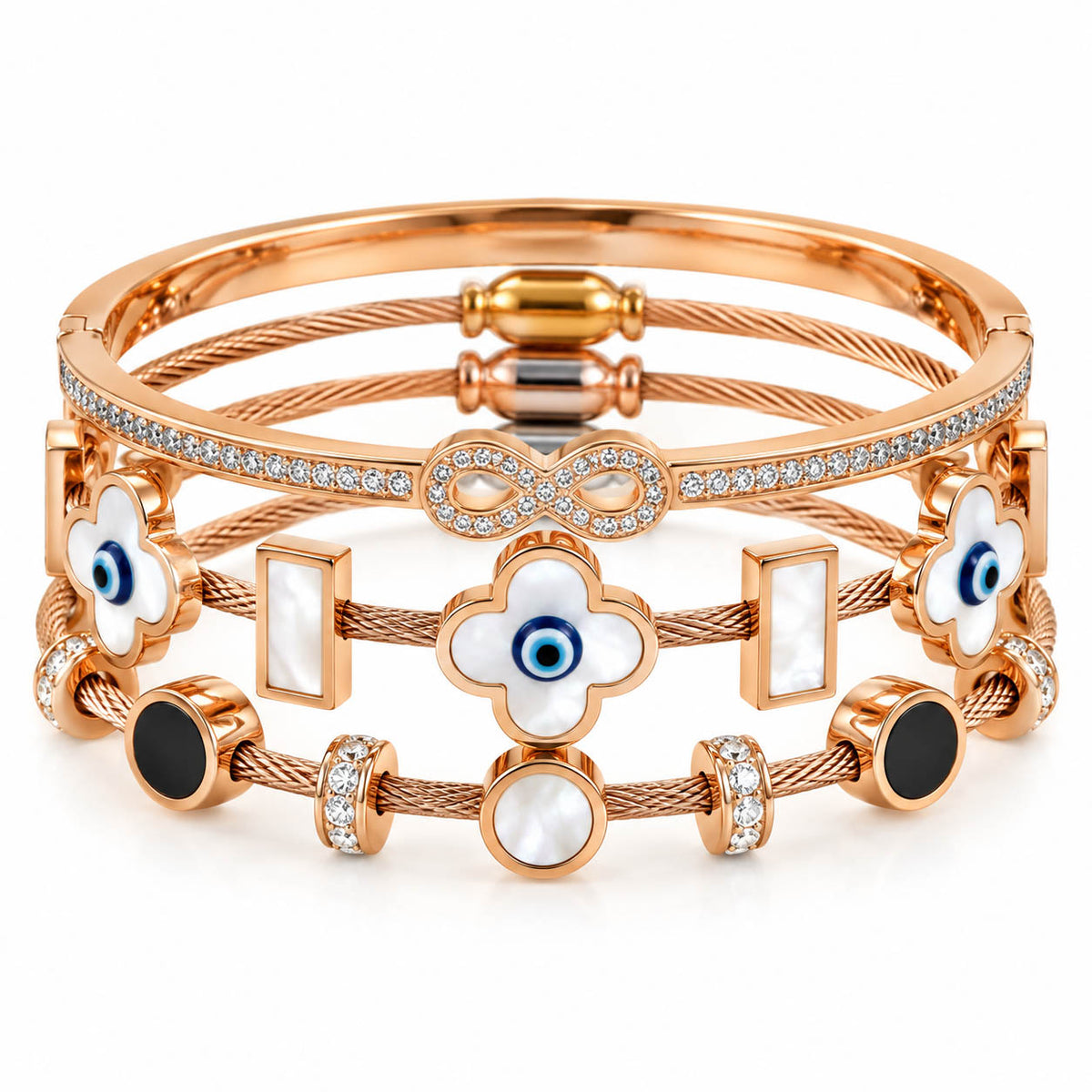 A studio shot of a curated stack of luxury rose gold cable wire bracelets, showcasing an infinity band encrusted with rhinestones, clover-shaped mother-of-pearl stations featuring central evil eyes, and geometric black and white stone inlays.
