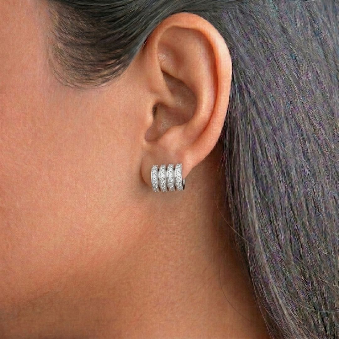 925 sterling silver triple band earrings with sparkling crystal detailing, perfect for everyday wear and elegant styling.
