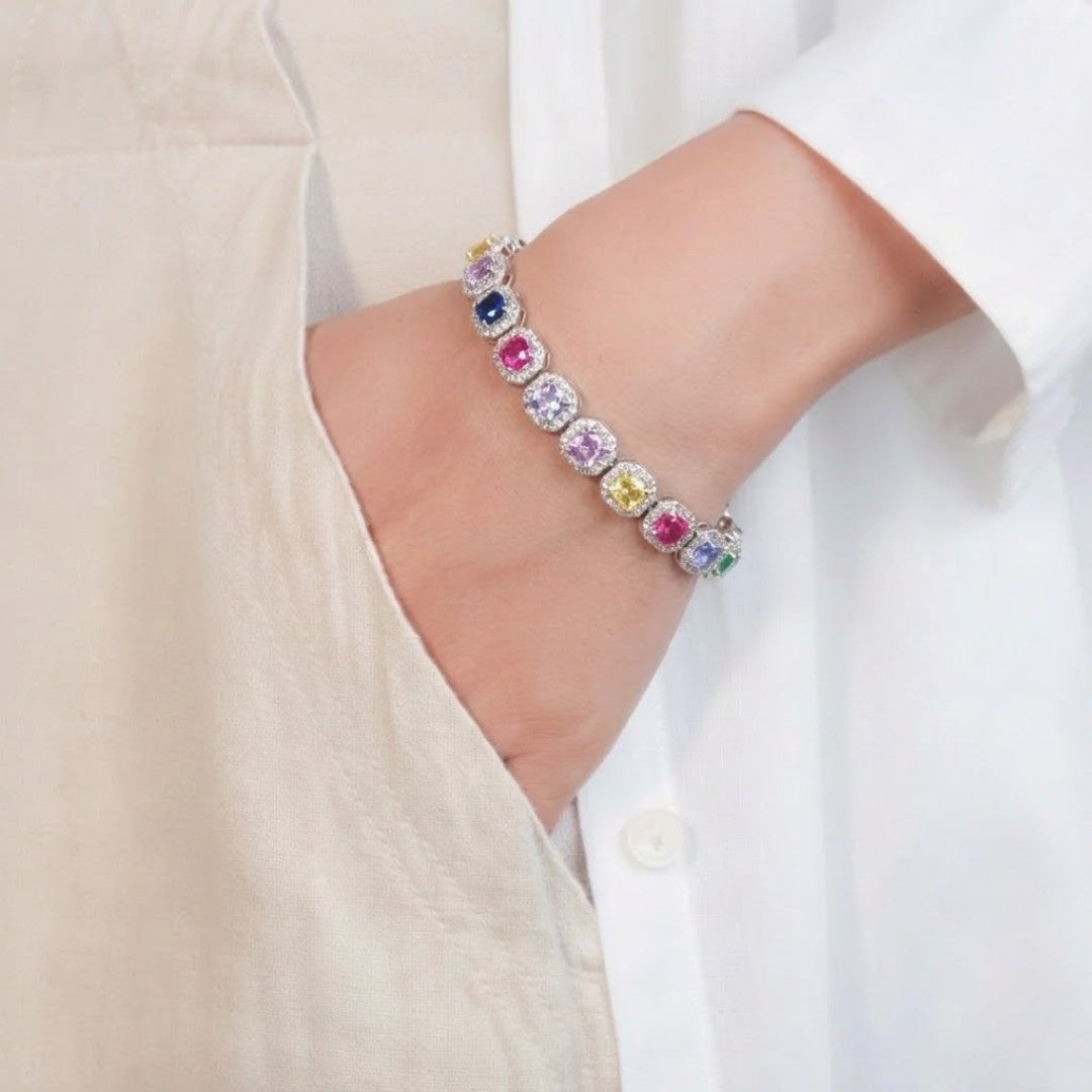 Victoria’s Prism tennis bracelet with cushion-cut stones and octagonal halo setting