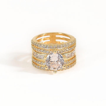 Broad diamond ring with brilliant crystal detailing and an anti-tarnish finish, available in gold, rose gold, and silver, perfect for everyday wear, statement styling, and elegant gifting.
