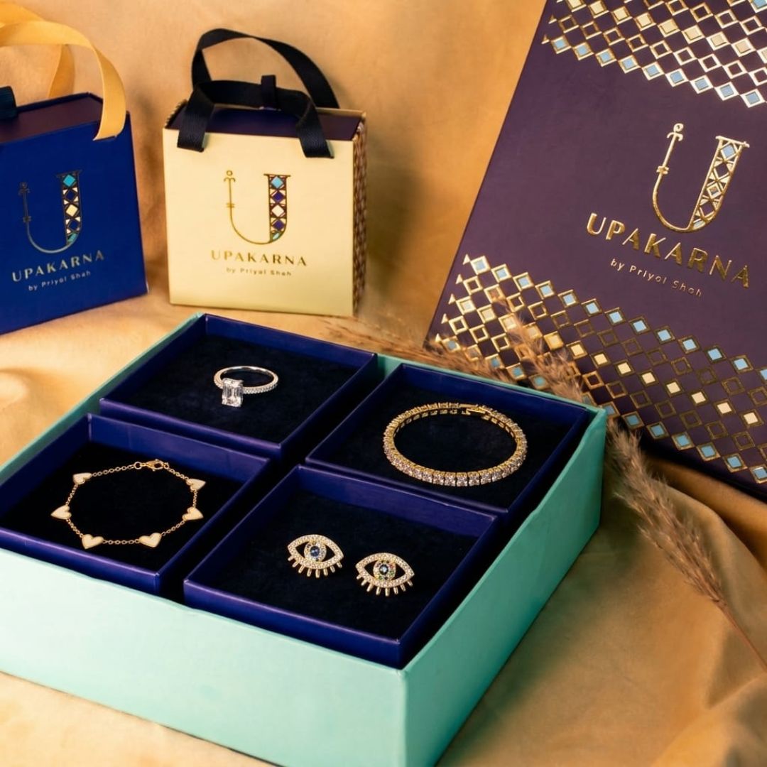 Jewelry set in a box with Upakarna branding