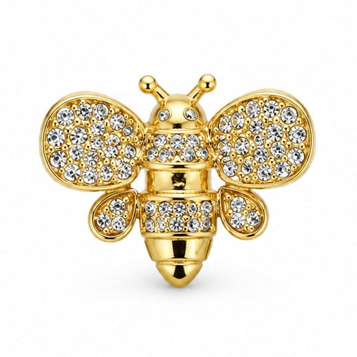 Gold bee jewellery charm embellished with multiple clear crystal stones on a white background.