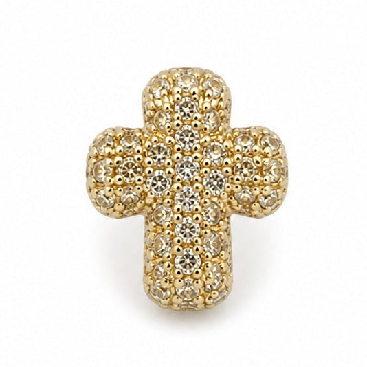 Gold cross jewellery charm embellished with multiple clear crystal stones on a white background.