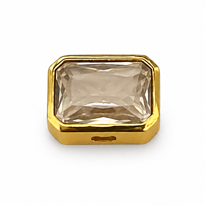 Gold Crystal jewellery charm featuring a large faceted champagne-colored crystal in a polished gold-tone setting on a white background.