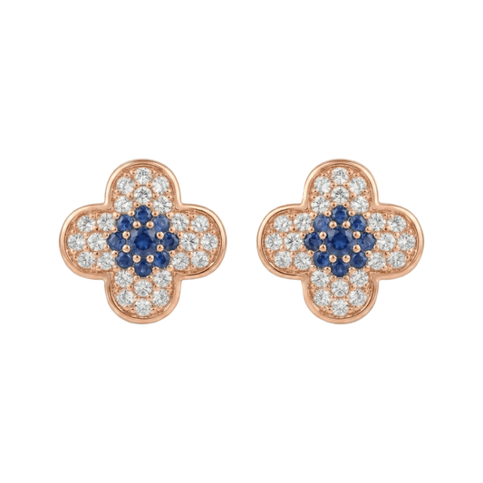 Crystal clover studs with blue crystal detailing and an anti-tarnish finish, available in gold, rose gold, and silver, perfect for everyday wear and elegant styling.
