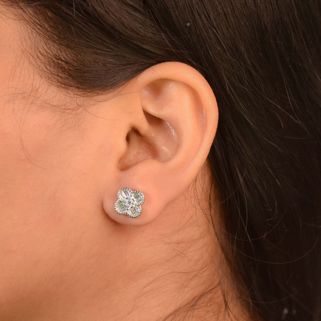Diamond clover studs with sparkling crystal detailing and an anti-tarnish silver finish, perfect for everyday wear and elegant styling.
