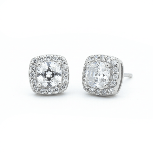 Timeless diamond square studs with sparkling halo crystal detailing and an anti-tarnish silver finish, perfect for everyday wear and elegant styling.
