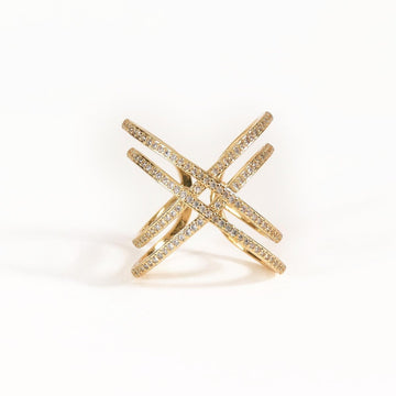 Double line criss-cross ring with sparkling crystal detailing and an anti-tarnish gold finish, perfect for everyday wear, elegant styling, and statement looks.
