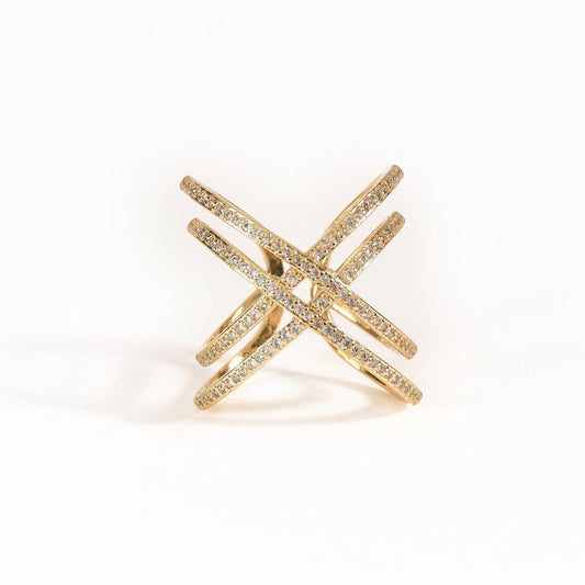Double line criss-cross ring with sparkling crystal detailing and an anti-tarnish gold finish, perfect for everyday wear, elegant styling, and statement looks.
