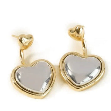 Gold-tone heart drop earrings featuring polished silver-tone heart centers and small heart-shaped studs.