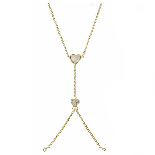 Dual heart hand chain with mother-of-pearl and crystal detailing, finished with an anti-tarnish gold finish, perfect for elegant styling and special occasions.
