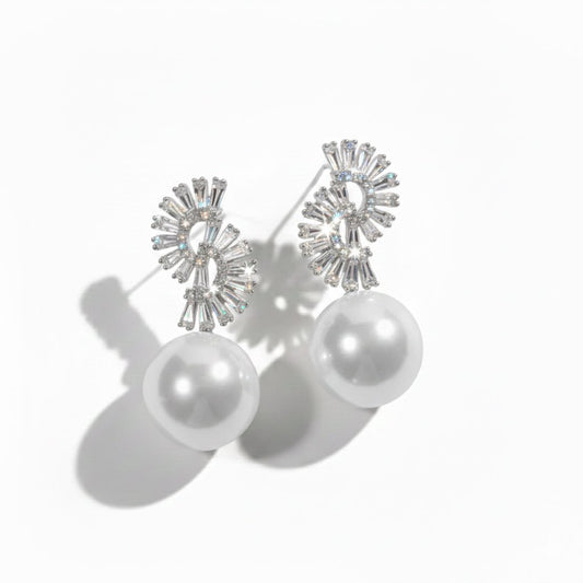 Gleaming Pearl Dangler Earrings, silver