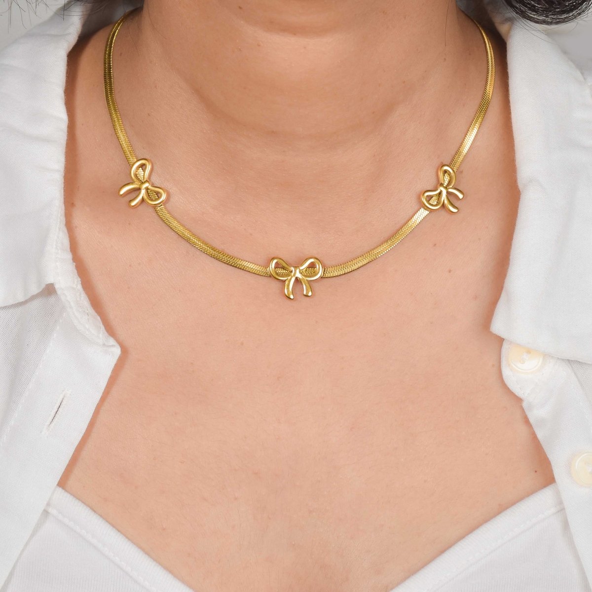 Gold Bow Necklace - Upakarnaproduct_type