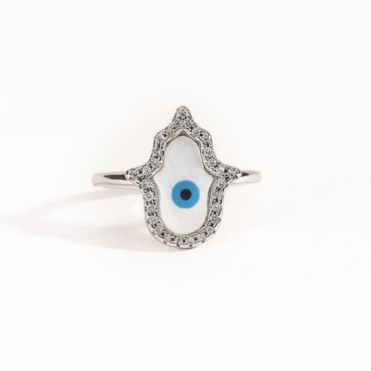Hamsa evil eye ring with sparkling crystal accents and an anti-tarnish silver finish, perfect for everyday wear, meaningful styling, and elegant statement looks.
