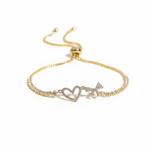 Heart bow bracelet with sparkling crystal detailing and an anti-tarnish finish, perfect for everyday wear, elegant styling, and thoughtful gifting.
