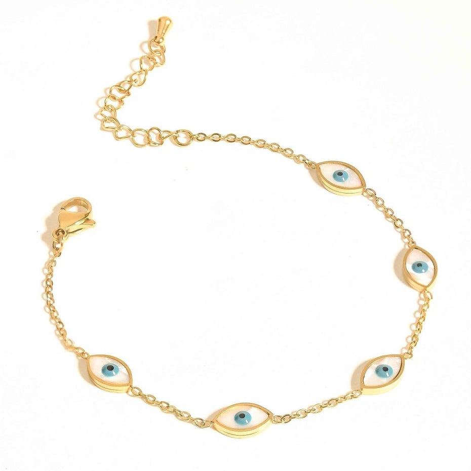 Gold-tone bracelet featuring five blue evil-eye charms on a delicate chain, designed for everyday elegance.